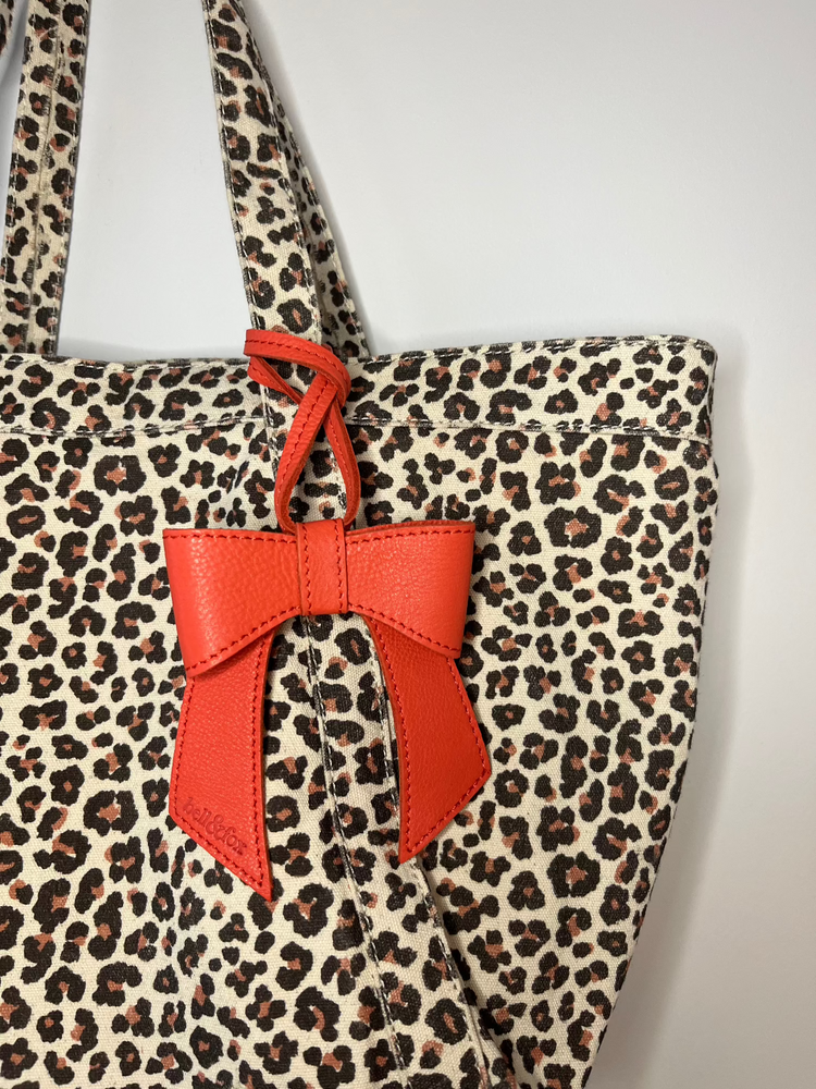 
                  
                    Load image into Gallery viewer, MINERVA Bow Bag Charm - Coral Leather
                  
                