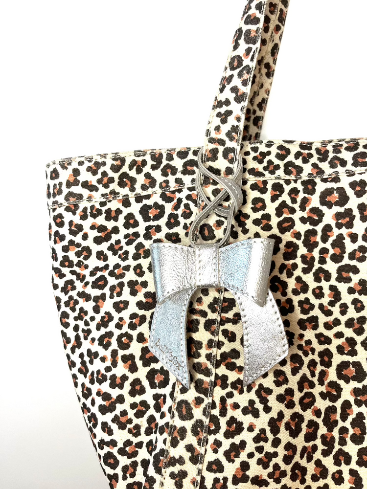 
                  
                    Load image into Gallery viewer, MINNIE Bow Bag Charm - Silver Leather
                  
                