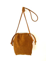 tan suede drawstring bag