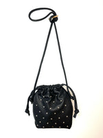 black leather drawstring bag with silver studs
