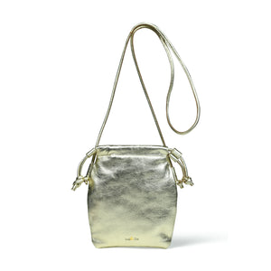 
                  
                    Load image into Gallery viewer, WILLOW Drawstring Crossbody Bag in Pale Gold Metallic Leather
                  
                