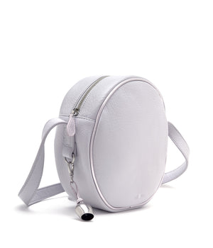 
                  
                    Load image into Gallery viewer, side detail showing bell bag charm on lavender leather canteen cross body bag
                  
                